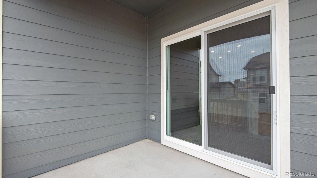 Exterior details and patio area of a home in Trails at Crowfoot, Parker (Image 4).