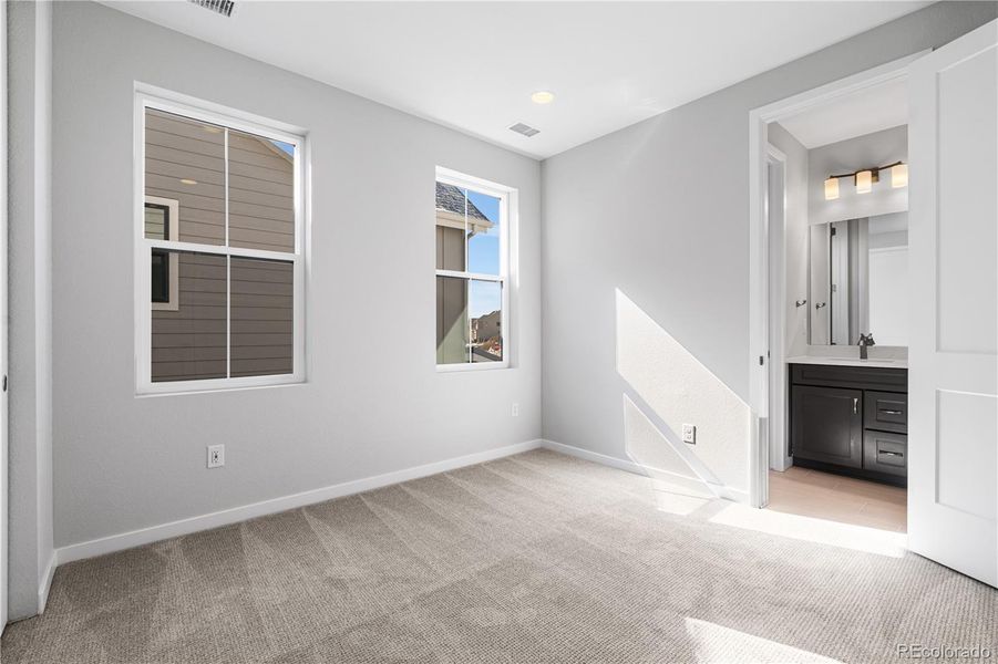 Spacious, unfurnished interior of a new home in Stargaze at Solstice, Littleton (Image 39).