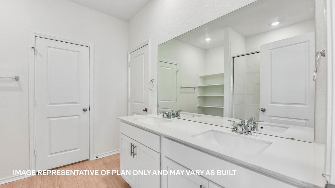 Representative furnished interior of a home built from the The Travis by D.R. Horton in Valverde, Bastrop (Image 11).
