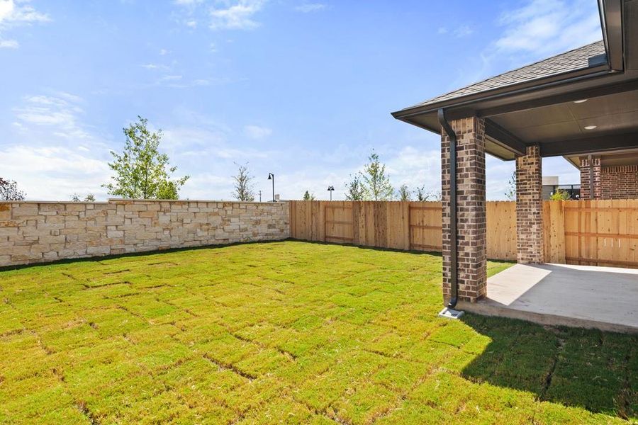 Exterior details and patio area of a home in Flora, Hutto (Image 24).