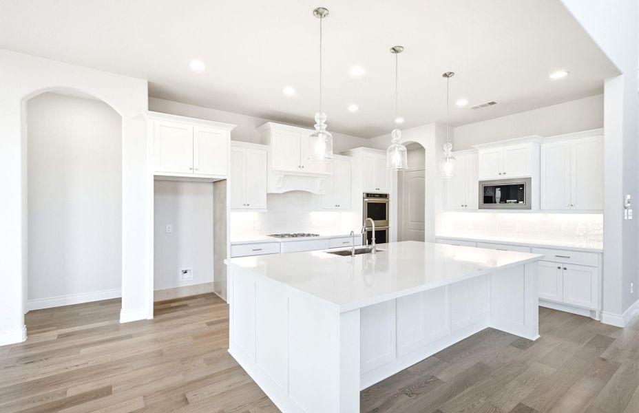 Furnished interior view inside a new home in Bridgeland 60′, Cypress (Image 11).