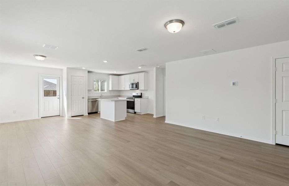 Nice island overlooking gathering room and dining areas Nice island overlooking gathering room and dining areas