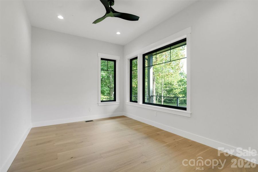 Spacious, unfurnished interior of a new home in , Horse Shoe (Image 18).