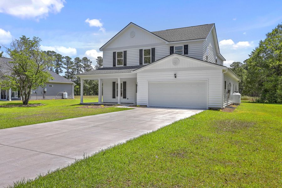 Front exterior of a new home in , Dorchester, SC, highlighting curb appeal (Image 25). Front exterior of a new home in , Dorchester, SC, highlighting curb appeal (Image 25).