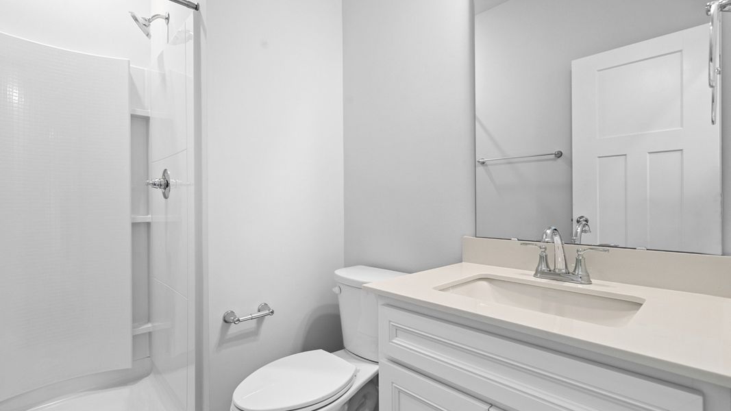 2 story single family home, all white, bathroom