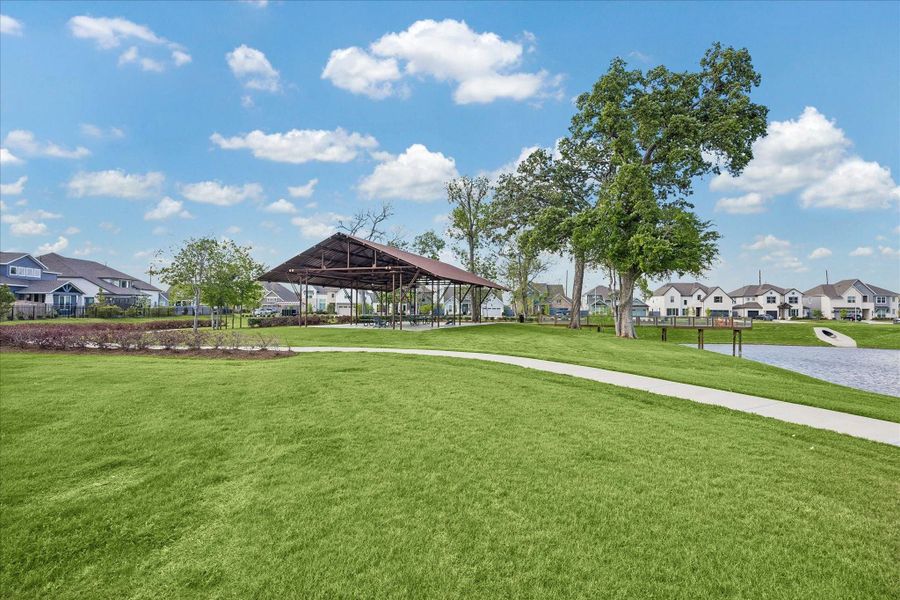 Scenic greenbelt setting with a covered pavilion, walking trails, and water views just steps from your backyard. Open green space and mature trees create a peaceful backdrop for outdoor gatherings and everyday enjoyment. Scenic greenbelt setting with a covered pavilion, walking trails, and water views just steps from your backyard. Open green space and mature trees create a peaceful backdrop for outdoor gatherings and everyday enjoyment.