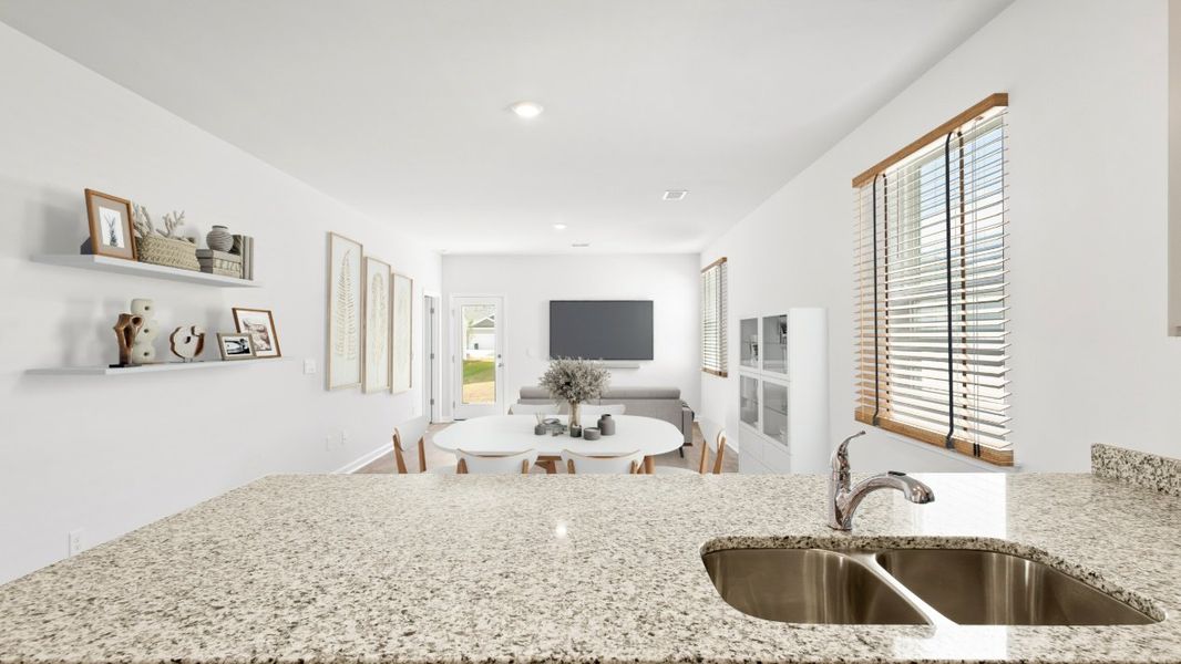 Representative furnished interior of a home built from the HELENA by D.R. Horton in Carolina Groves, Moncks Corner (Image 5).