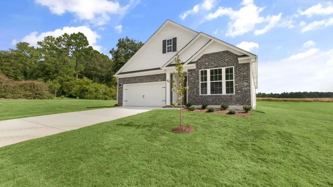 Front exterior of a new home in The Villas at Galvins Ridge, Sanford, NC, highlighting curb appeal (Image 17).