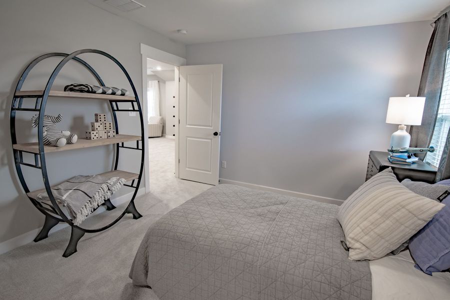Representative furnished interior of a home built from the Willow by Grant & Co in Manor at Hall Creek, Arlington (Image 48).
