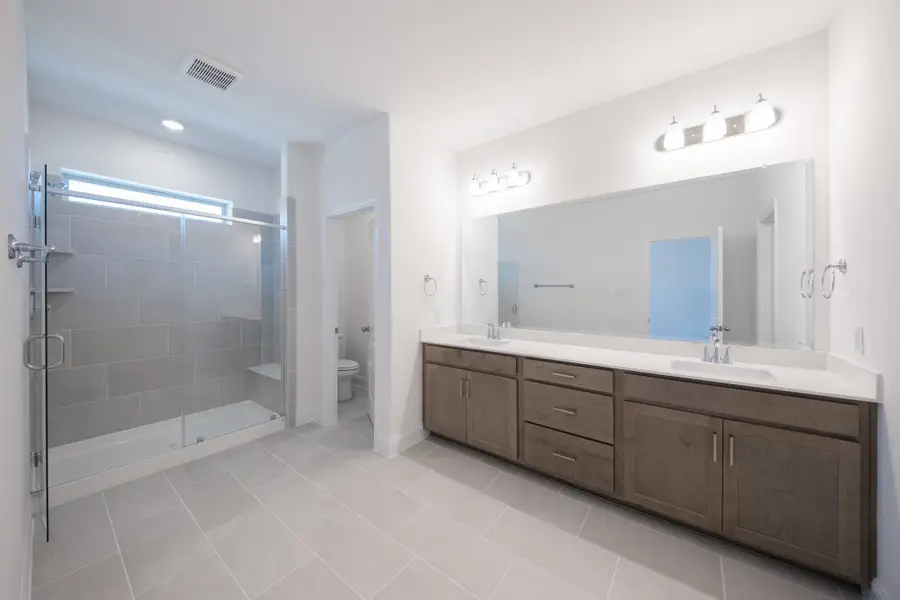 Furnished interior view inside a new home in Bayside, Rowlett (Image 8).