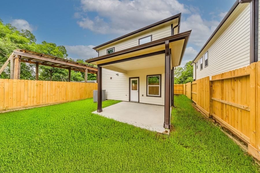 Enjoy relaxing evenings on the covered back patio deck, perfect for outdoor gatherings and comfort. Enjoy relaxing evenings on the covered back patio deck, perfect for outdoor gatherings and comfort.