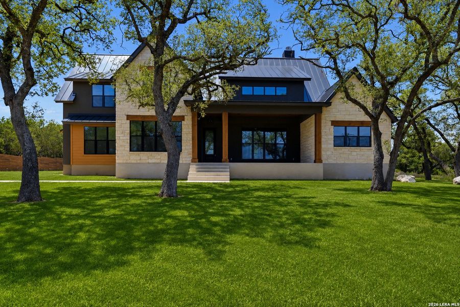 Exterior details and patio area of a home in , Spring Branch (Image 3).