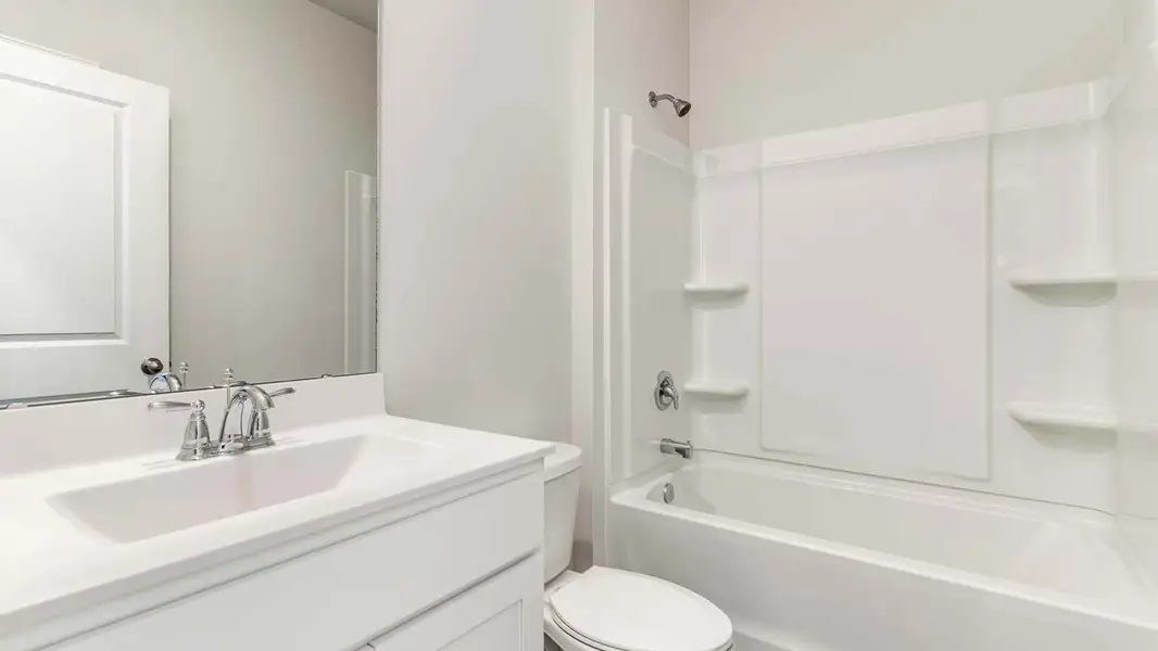 Representative furnished interior of a home built from the ARIA by D.R. Horton in Sandridge Park, Little River (Image 4).