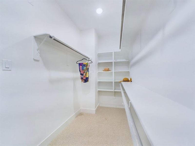 Primary Bedroom walk-in Closet.