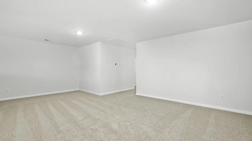 Spacious, unfurnished interior of a new home in Lybrook Village, Advance (Image 18).