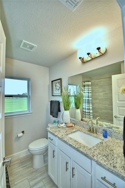 Furnished interior view inside a new home in Cadence Crossing, Auburndale (Image 15).