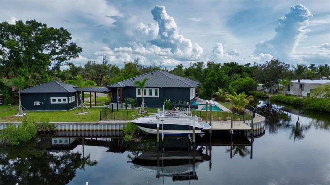 Front exterior of a new home in , Punta Gorda, FL, highlighting curb appeal (Image 35).