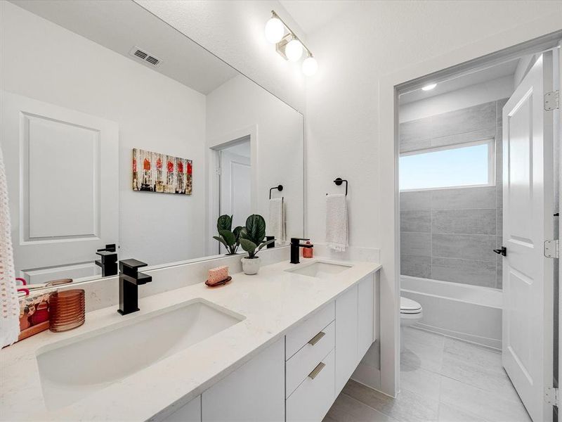 Furnished interior view inside a new home in Royal Court, Little Elm (Image 17).