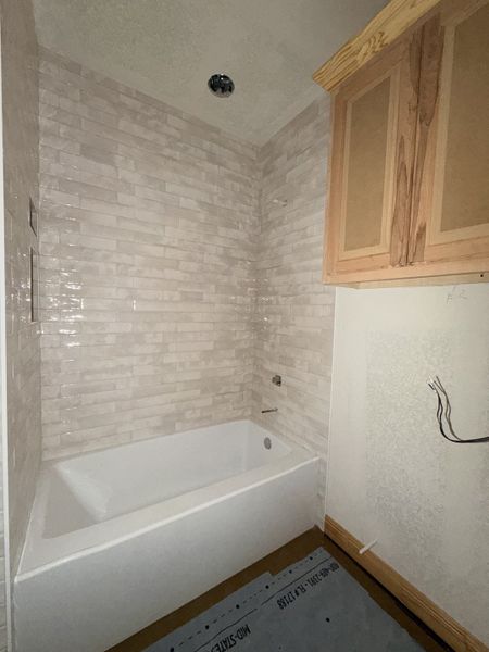 In-progress construction of a new home in Saddle Crest Estates, Weatherford, TX (Image 27).