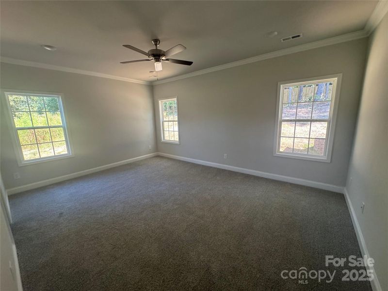 Primary Bedroom w/crown molding