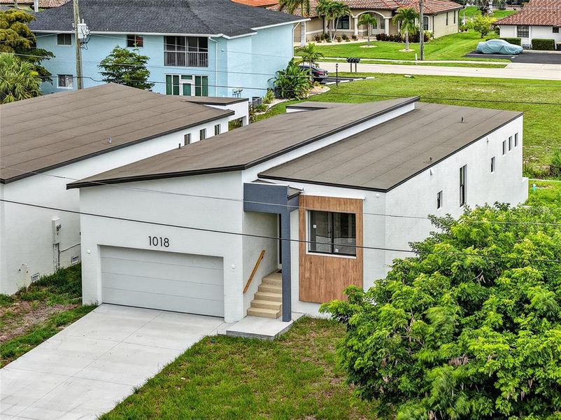 Front exterior of a new home in , Punta Gorda, FL, highlighting curb appeal (Image 20). Front exterior of a new home in , Punta Gorda, FL, highlighting curb appeal (Image 20).