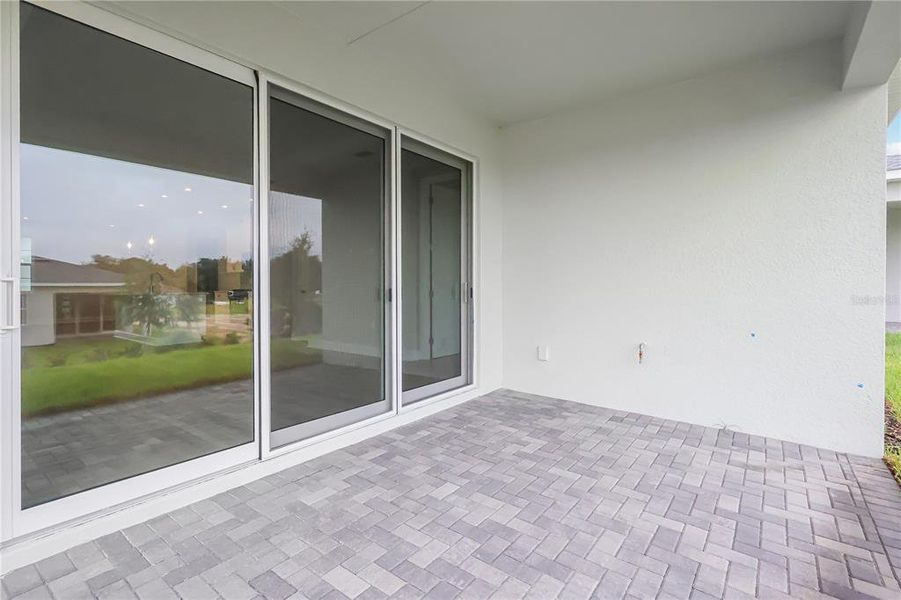 Exterior details and patio area of a home in Cresswind at Hammock Oaks, Lady Lake (Image 4).