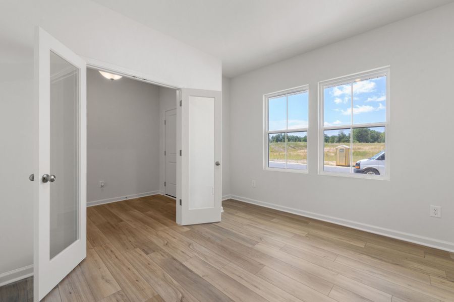Spacious, unfurnished interior of a new home in Wimberly, Willow Spring (Image 41).