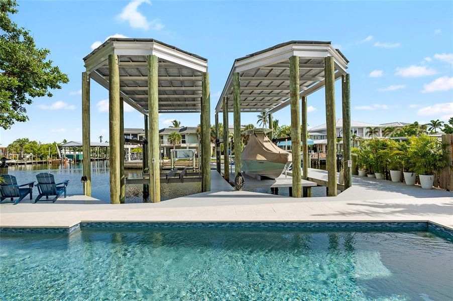 Front exterior of a new home in , Boca Grande, FL, highlighting curb appeal (Image 28). Front exterior of a new home in , Boca Grande, FL, highlighting curb appeal (Image 28).