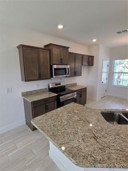 Furnished interior view inside a new home in Pine Bluff, Spring Hill (Image 6).