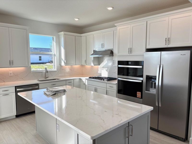 Furnished interior view inside a new home in Costa Pointe, Vero Beach (Image 7).