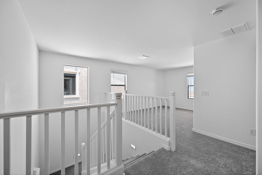 Spacious, unfurnished interior of a new home in Artisan at Asante, Surprise (Image 27).