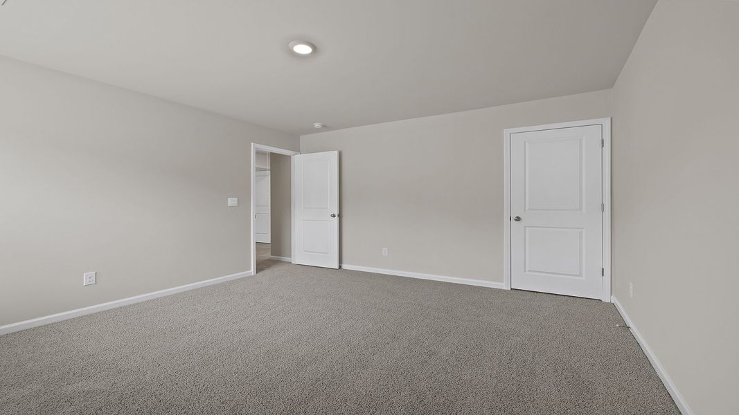 Spacious, unfurnished interior of a new home in Bentley Park, Greenwood (Image 25).