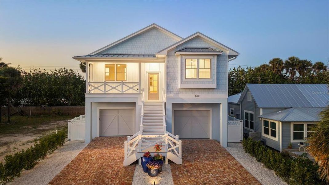 Front exterior of a new home in , Boca Grande, FL, highlighting curb appeal (Image 30).