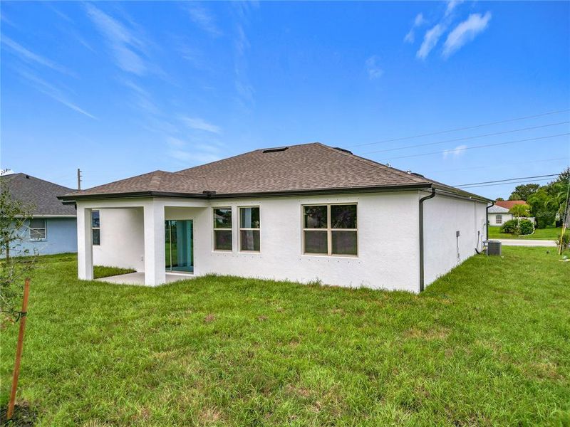 Exterior details and patio area of a home in , North Port (Image 24).