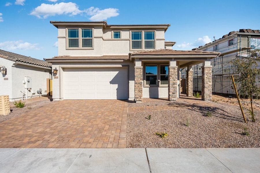 Representative exterior photo of a completed home built from the Wedgewood by Taylor Morrison in Allen Ranches Discovery Collection, Litchfield Park, AZ (Image 16).
