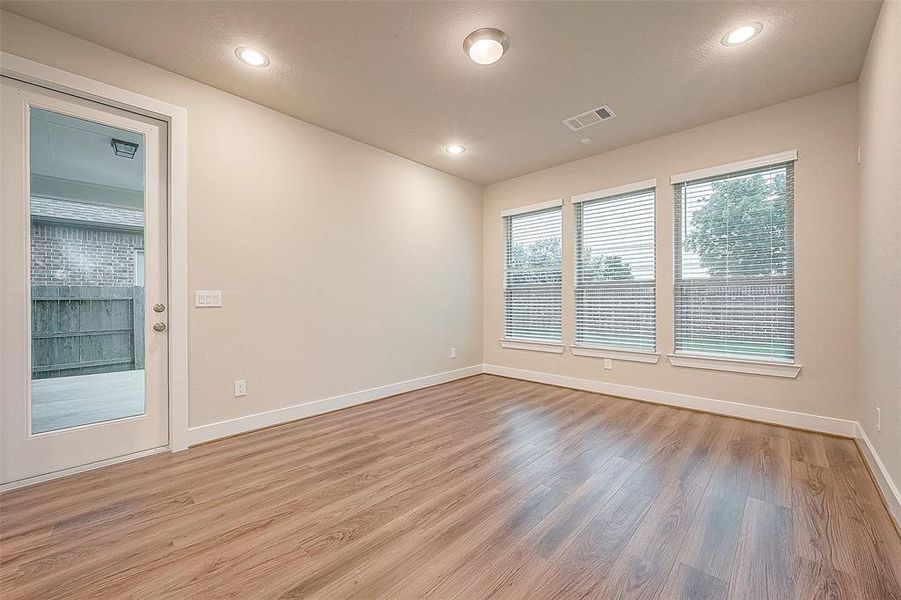 Open to the kitchen, the dining room offers plenty of room to accommodate the largest of dining tables.