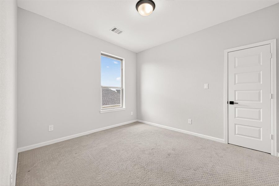 Spacious, unfurnished interior of a new home in Cane Island, Katy (Image 32).