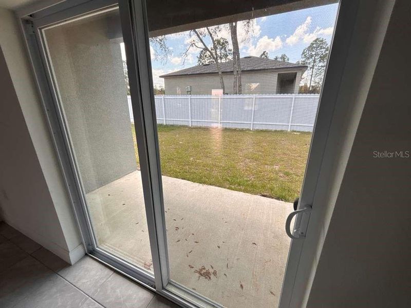 Exterior details and patio area of a home in , Citrus Springs (Image 16).