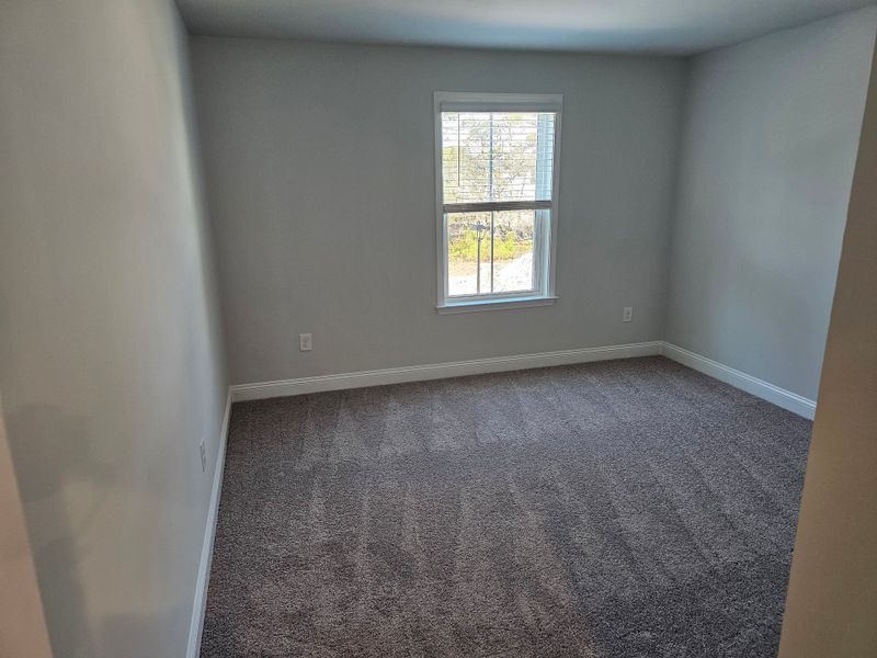 Spacious, unfurnished interior of a new home in Solserra, Shallotte (Image 12).