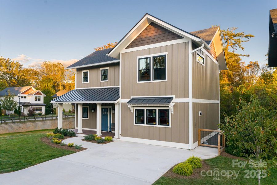 Front exterior of a new home in , Asheville, NC, highlighting curb appeal (Image 2). Front exterior of a new home in , Asheville, NC, highlighting curb appeal (Image 2).