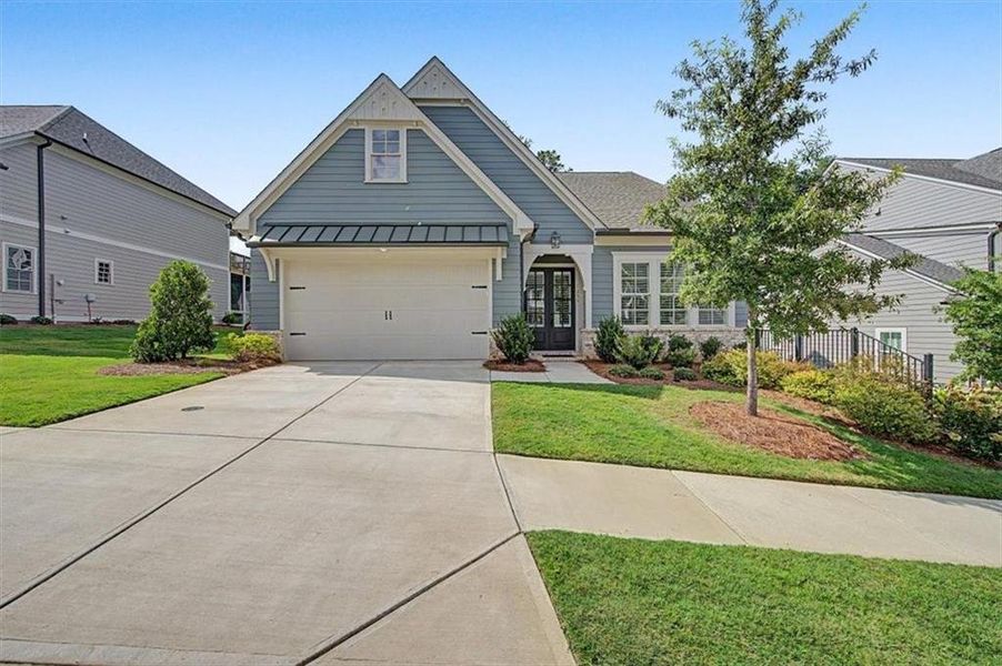Front exterior of a new home in Lakeside at River Green, Canton, GA, highlighting curb appeal (Image 24).