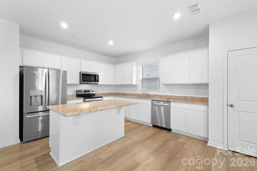 Furnished interior view inside a new home in Spring Meadow, Concord (Image 9).