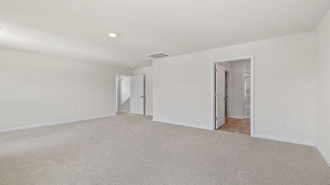 Spacious, unfurnished interior of a new home in Durbin Meadows Traditions, Fountain Inn (Image 25).