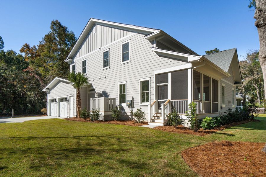 Exterior details and patio area of a home in , Johns Island (Image 35).