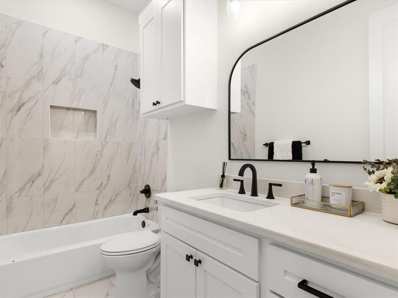 Full bathroom with vanity and  shower combination