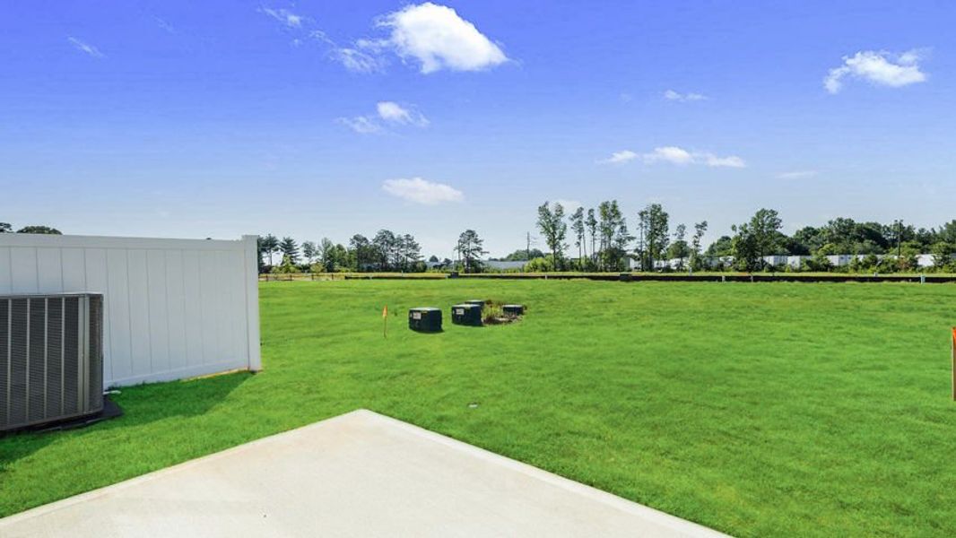 Exterior details and patio area of a home in Covington Village, Greer (Image 22).