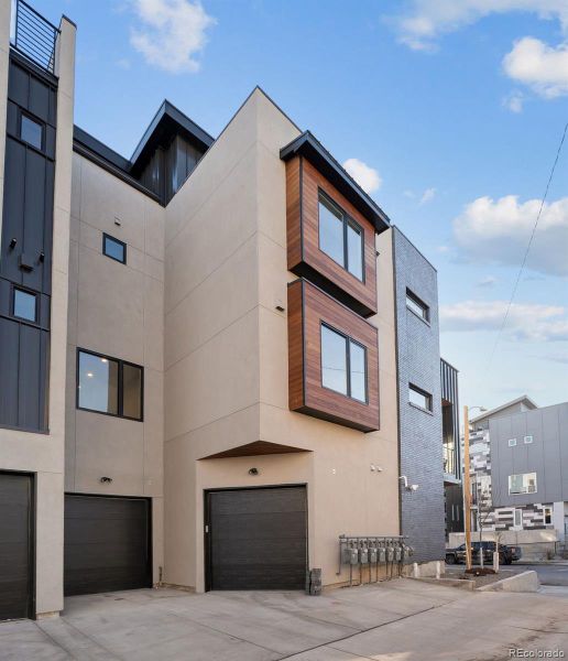 Front exterior of a new home in , Denver, CO, highlighting curb appeal (Image 22).