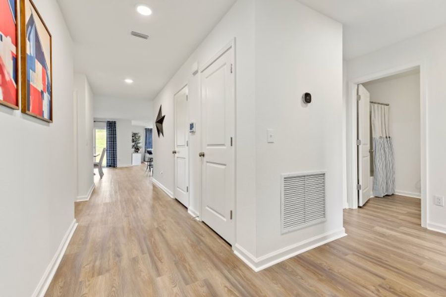 A room with white cabinets.