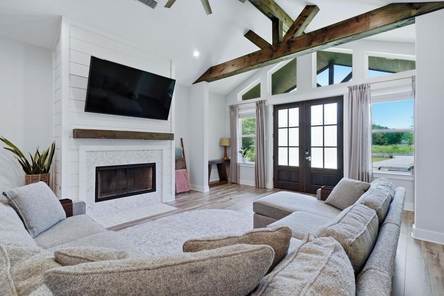 Beautiful fireplace, wood beam mantle. Texas sized windows letting in a ton of natural light! Beautiful fireplace, wood beam mantle. Texas sized windows letting in a ton of natural light!