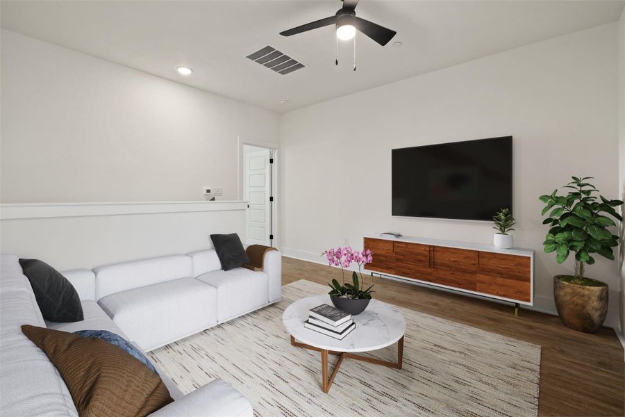 Upstair living room with wood finished floors, recessed lighting, and ceiling fan Upstair living room with wood finished floors, recessed lighting, and ceiling fan